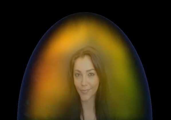 Aura photography example showing a woman surrounded by yellow and green aura colors.